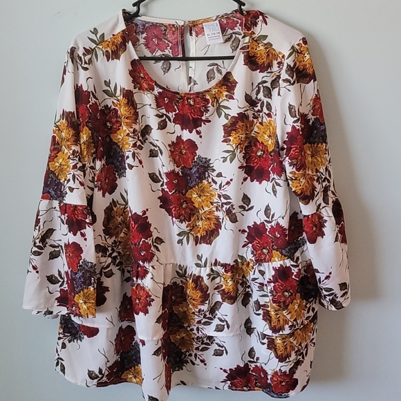 Floral Peplum Top - Picture 1 of 4